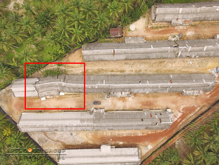 Figure 1: Aerial view revealed the allegedly windstorm-affected section of Barn X (red rectangle).